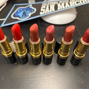 Give away 5 others buy 6 Revlon Black Lipstick